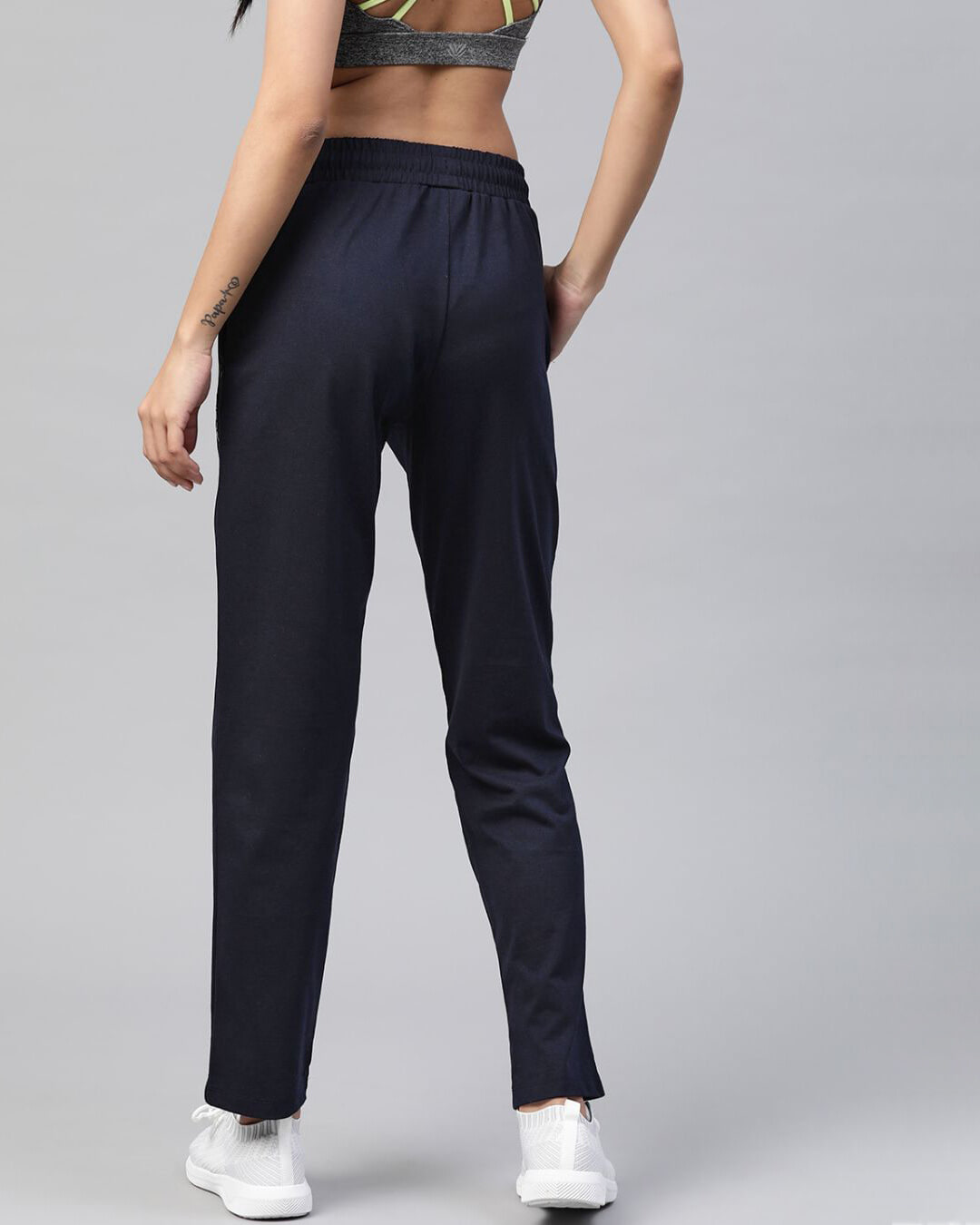 Shop Women Navy Blue Slim Fit Solid Knitted Track Pants-Back