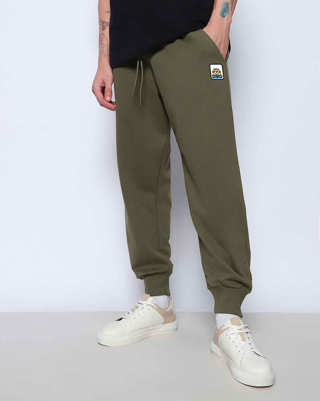 Buy Men's Olive Green Minion Badge Printed Oversized Joggers Online at ...