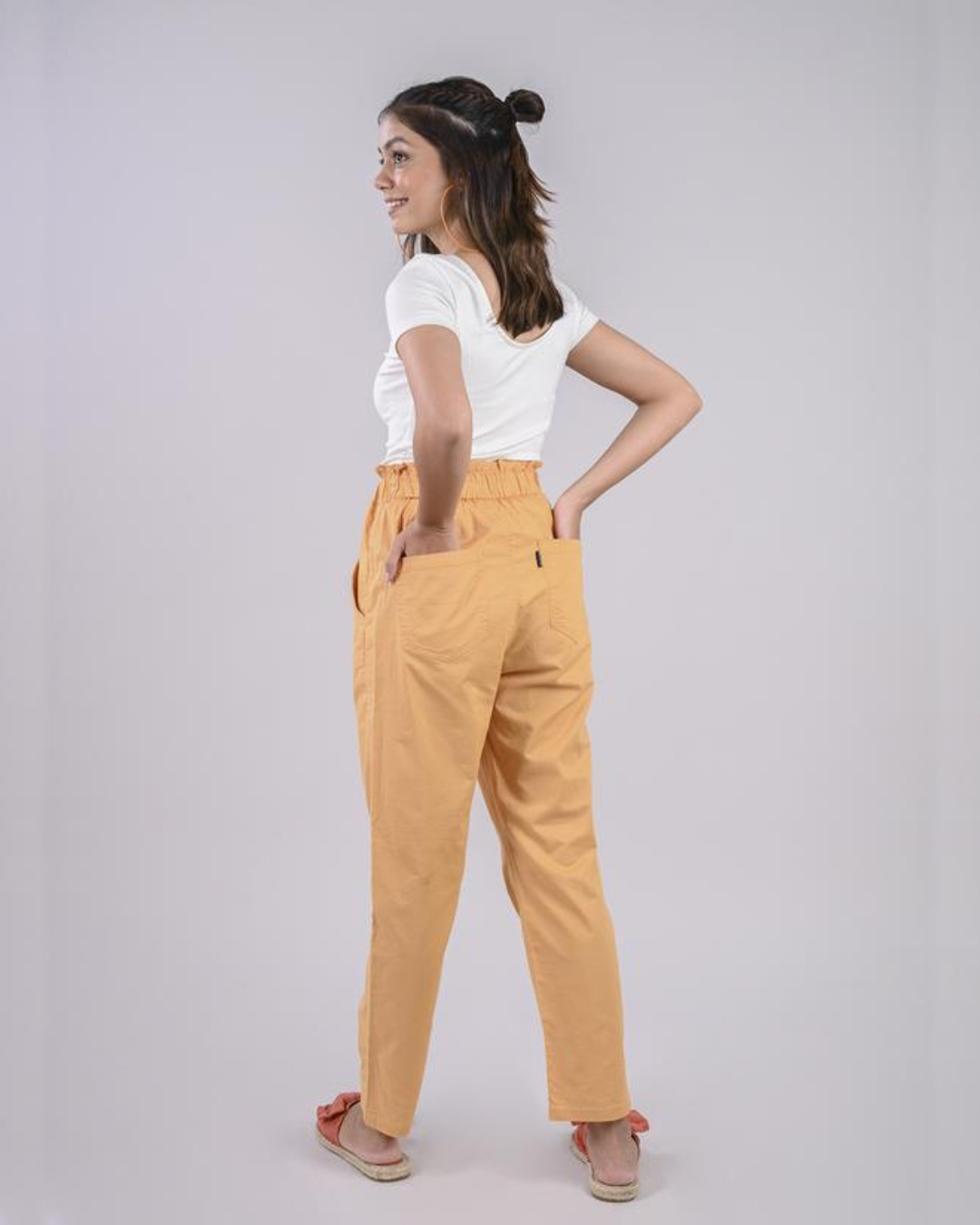 Shop Women Beige Solid Tapered Fit Casual Pants-Back