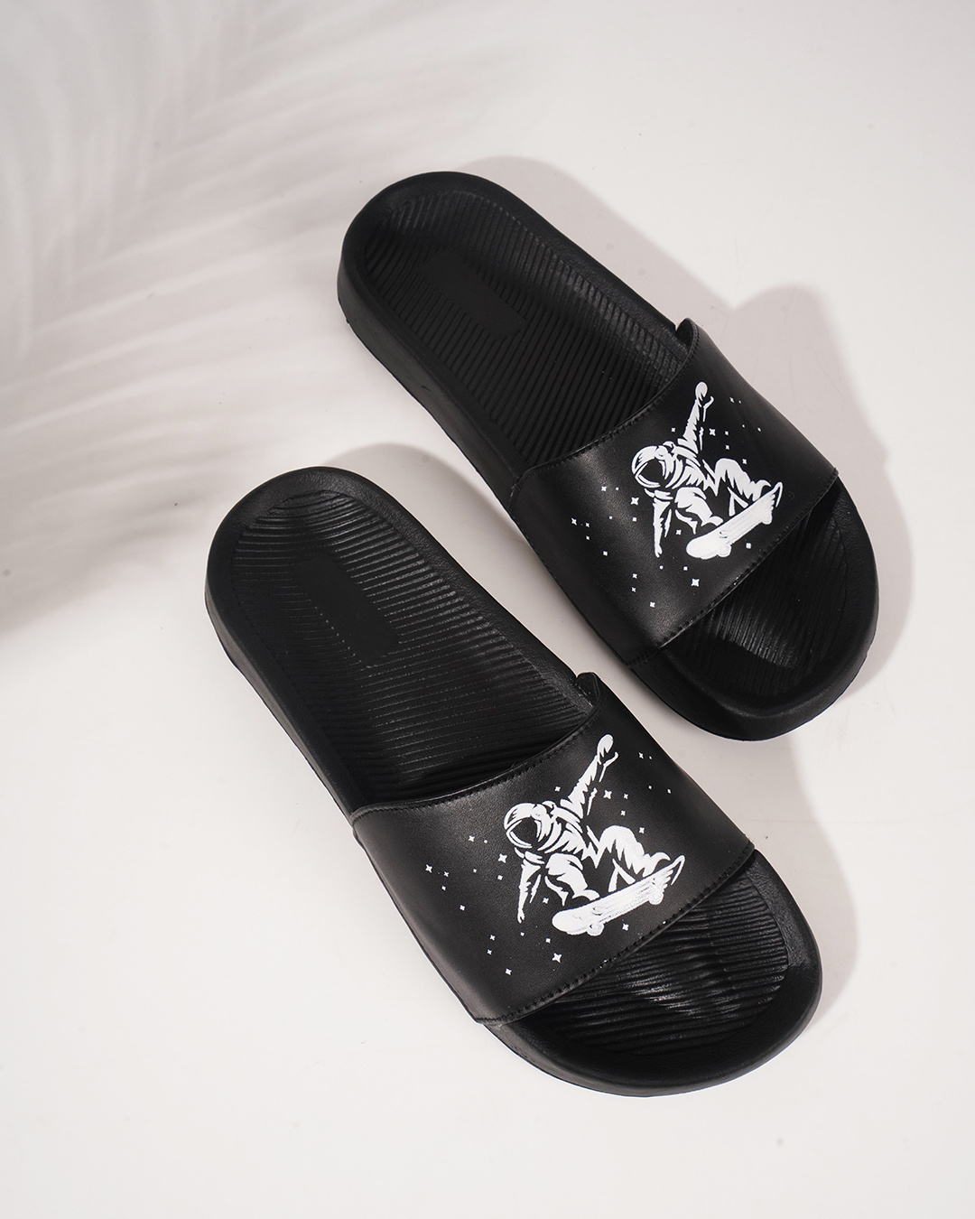 Buy Men's Black Printed Sliders Online in India at Bewakoof