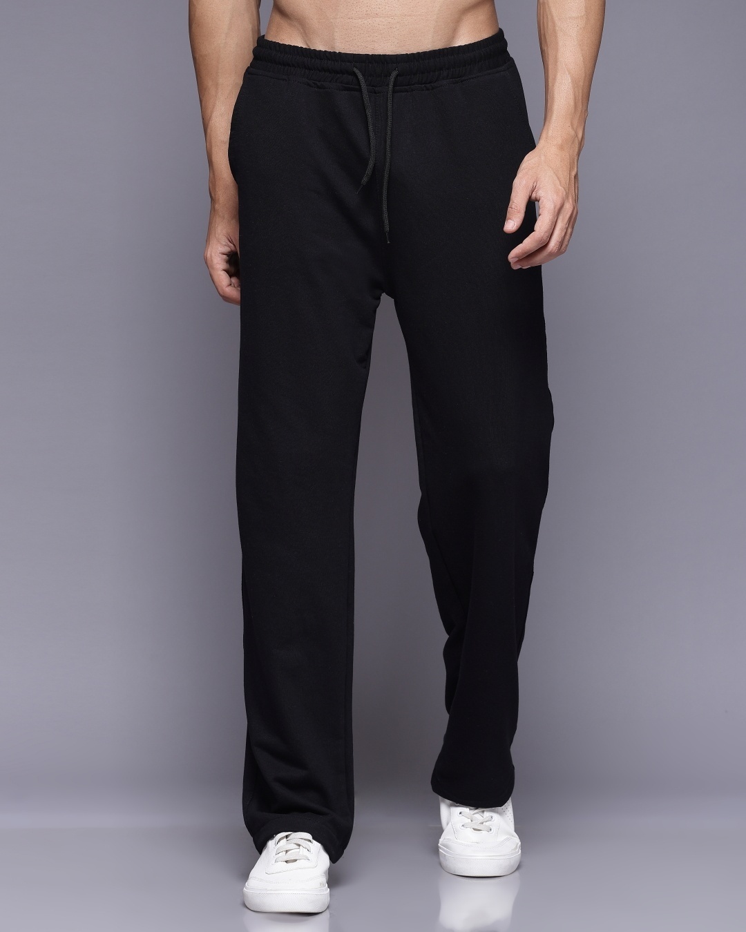 Buy Men's Black Relaxed Fit Track Pants Online at Bewakoof