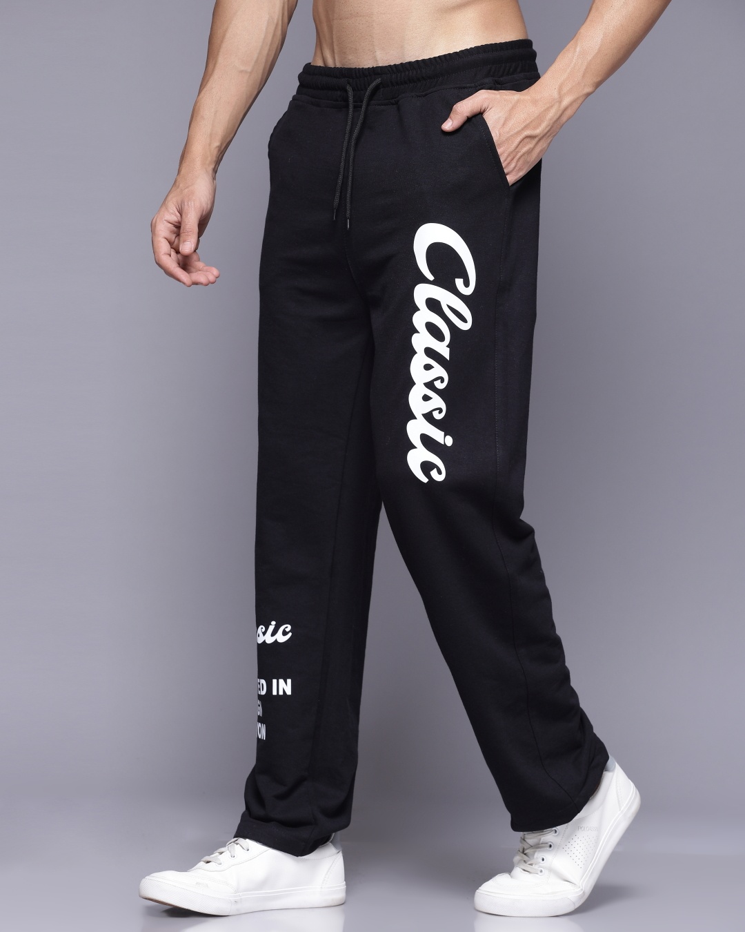 Buy Men's Black Typography Relaxed Fit Track Pants Online at Bewakoof