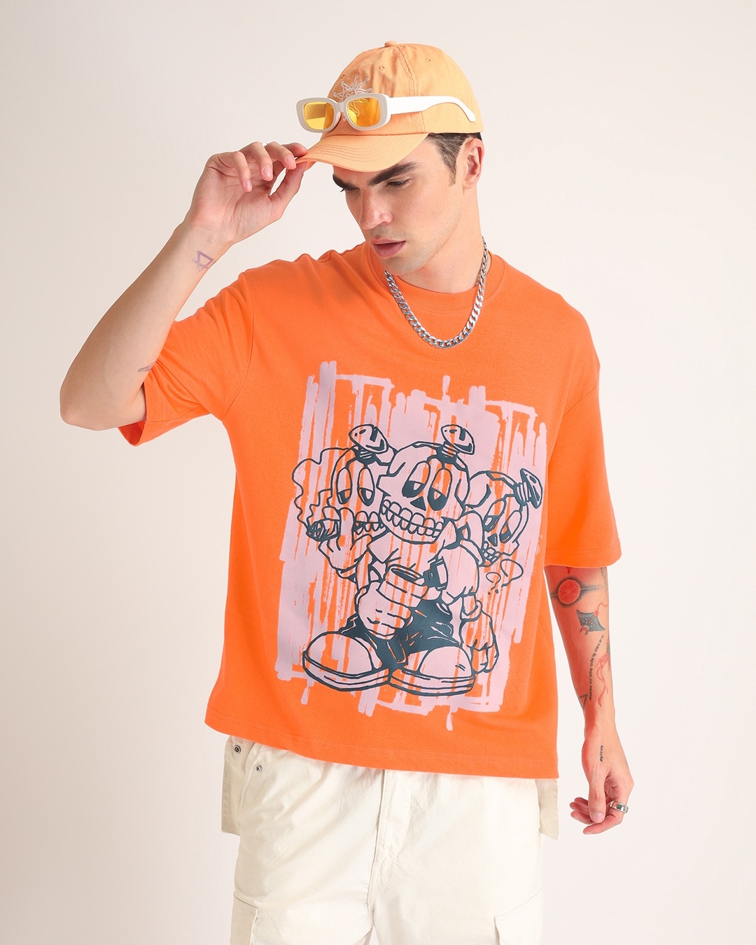 Buy Men's Neon Orange Pain Killers Puff Printed Oversized T-shirt 