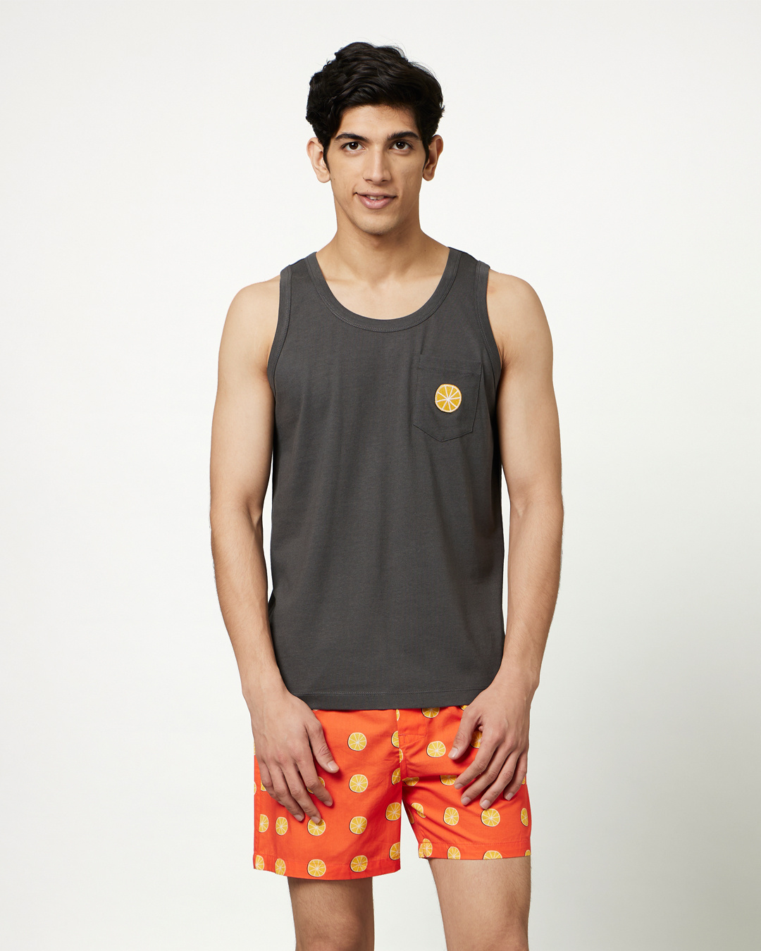 Buy Men's Orange Get Squeezing Printed Vest & Boxer Set Online in India
