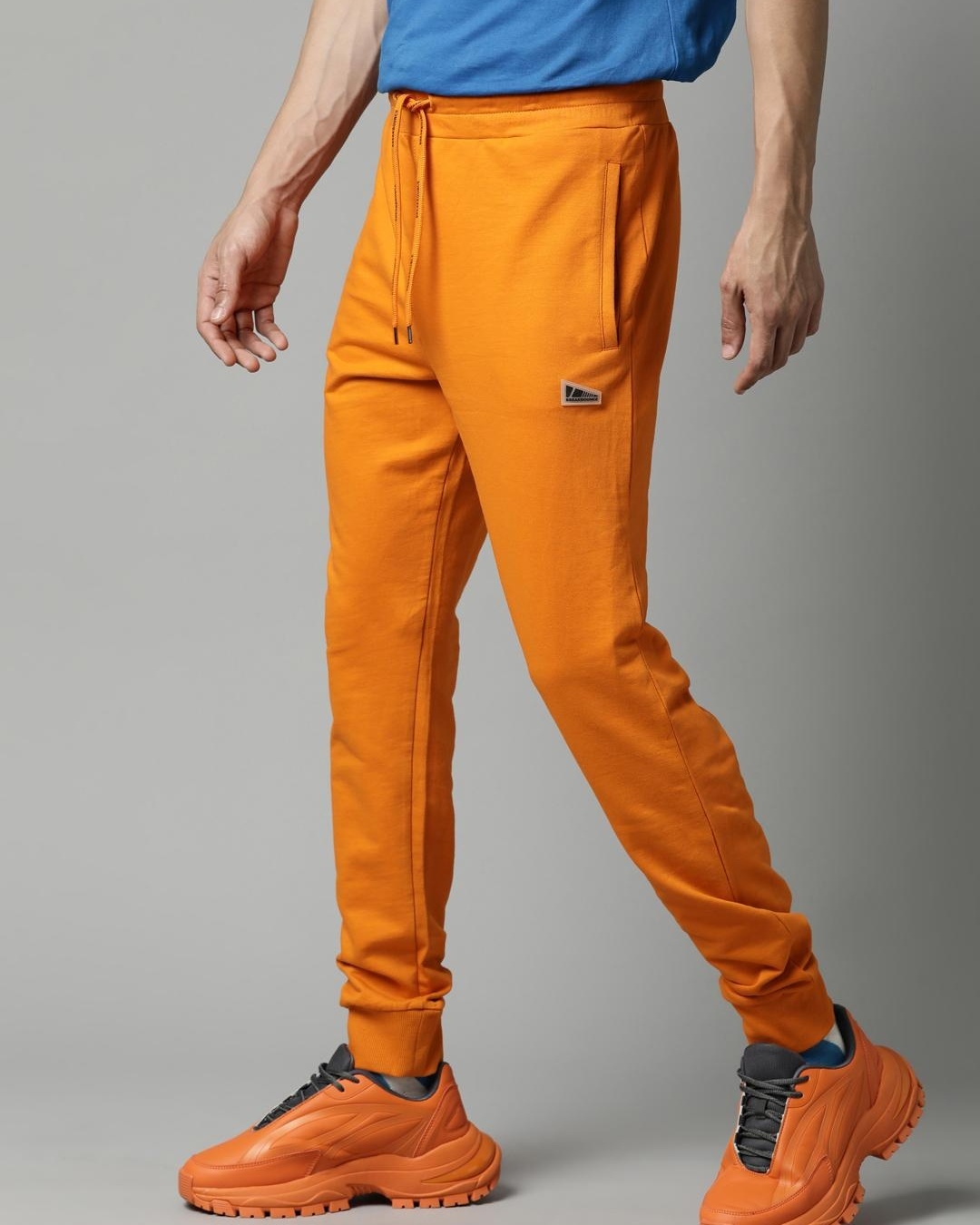 Buy Men's Orange Joggers Online at Bewakoof