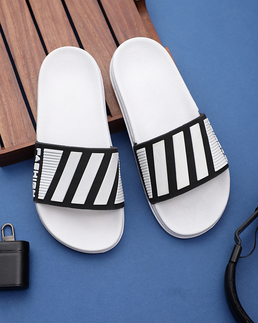 Buy Men's White & Black Striped Sliders Online in India at Bewakoof