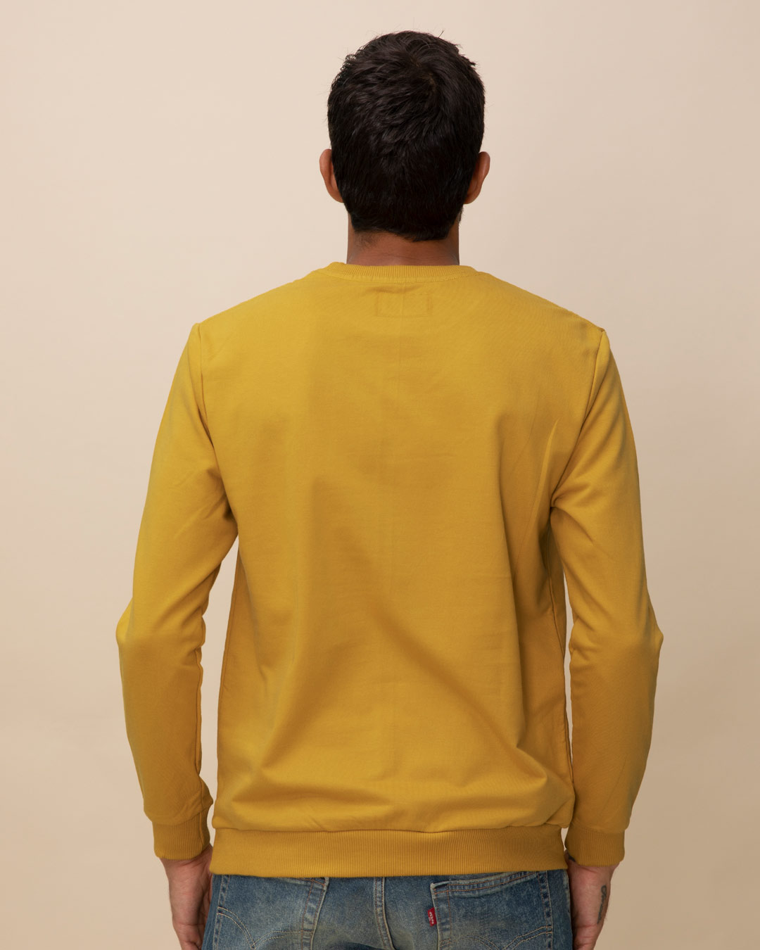 mustard yellow sweatshirt