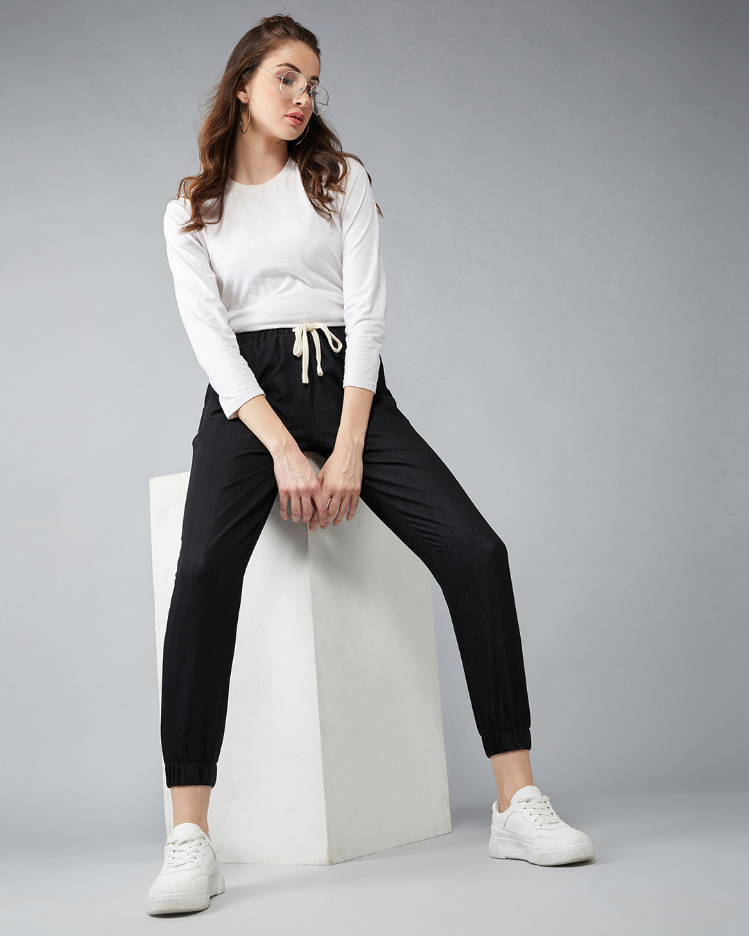 Buy Women's Black Mid Rise Regular Fit Joggers Online at Bewakoof