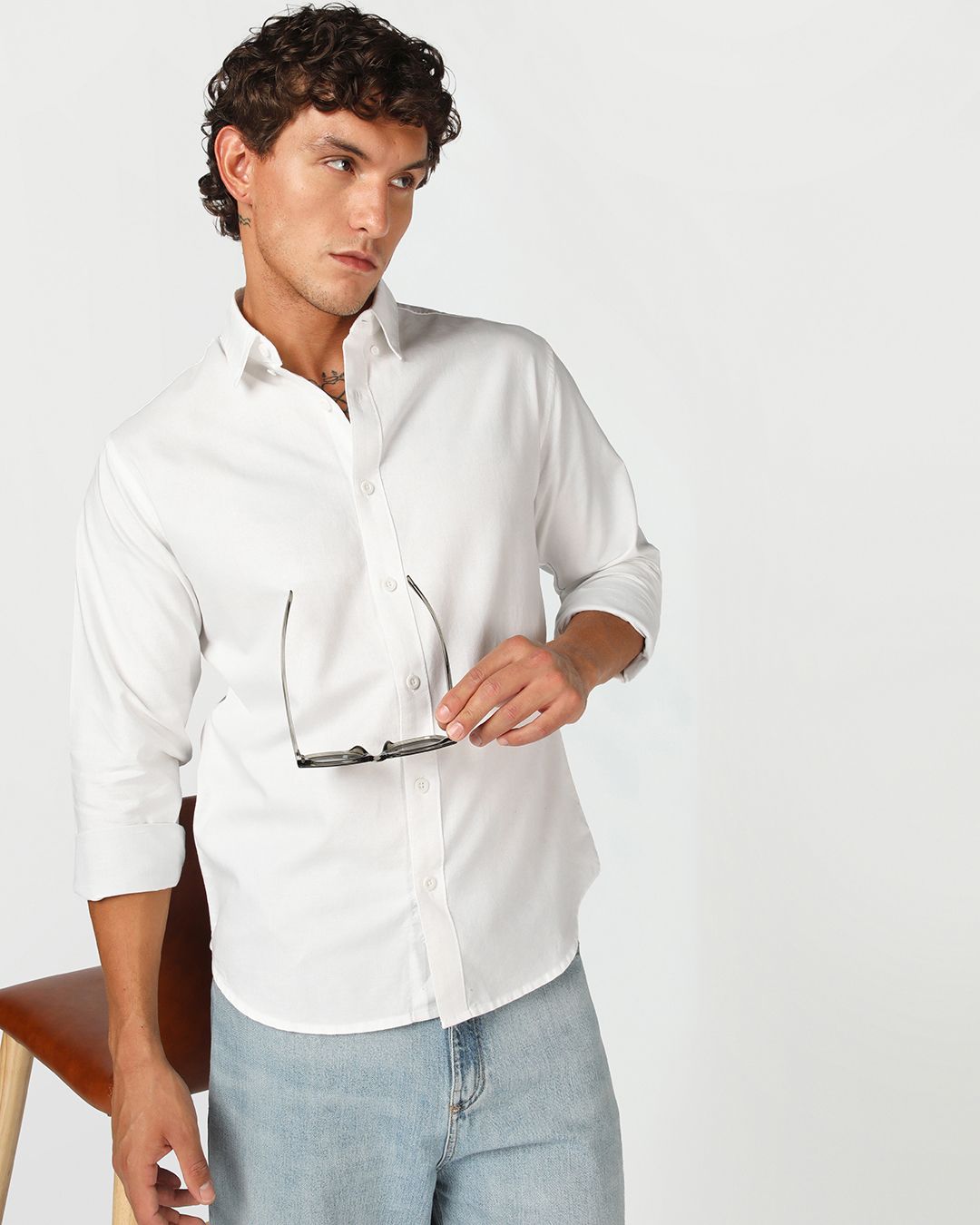 man wearing white shirt with blue pant 