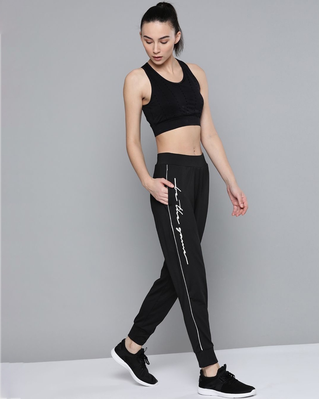 Shop Women Black Slim Fit Solid Joggers With Typographic Detail