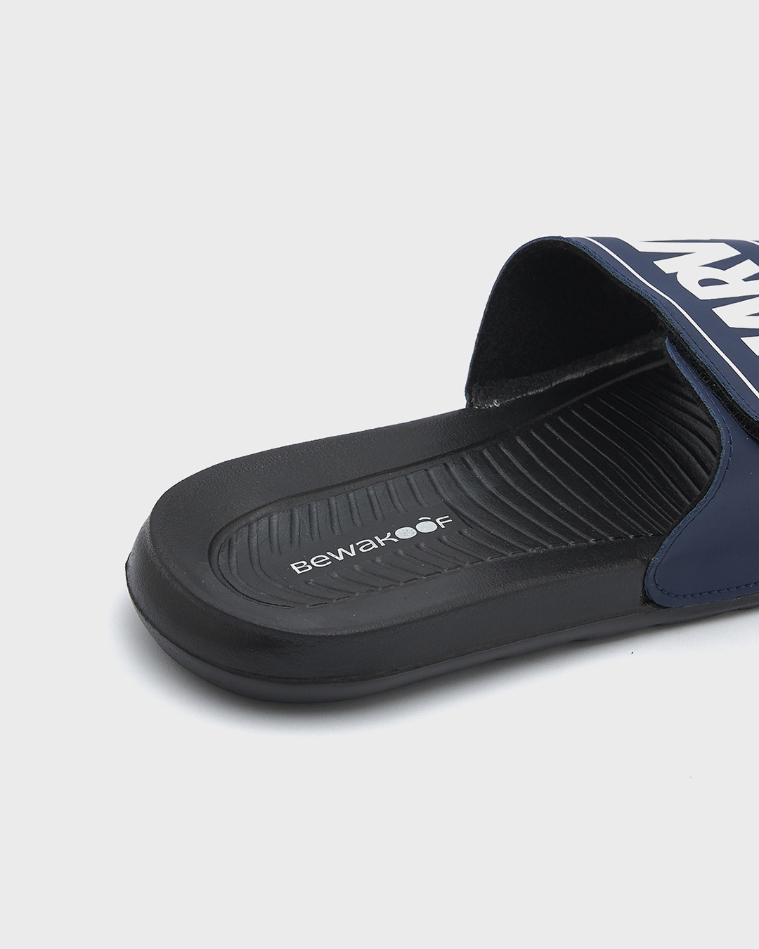 Buy Men's Black & Blue Marvel Printed Sliders Online in India at Bewakoof