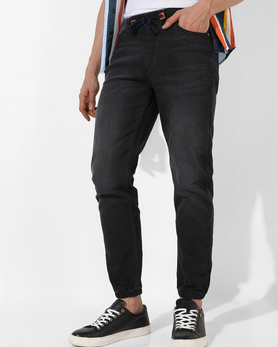 Men's Black Washed Jeans paired with loafers