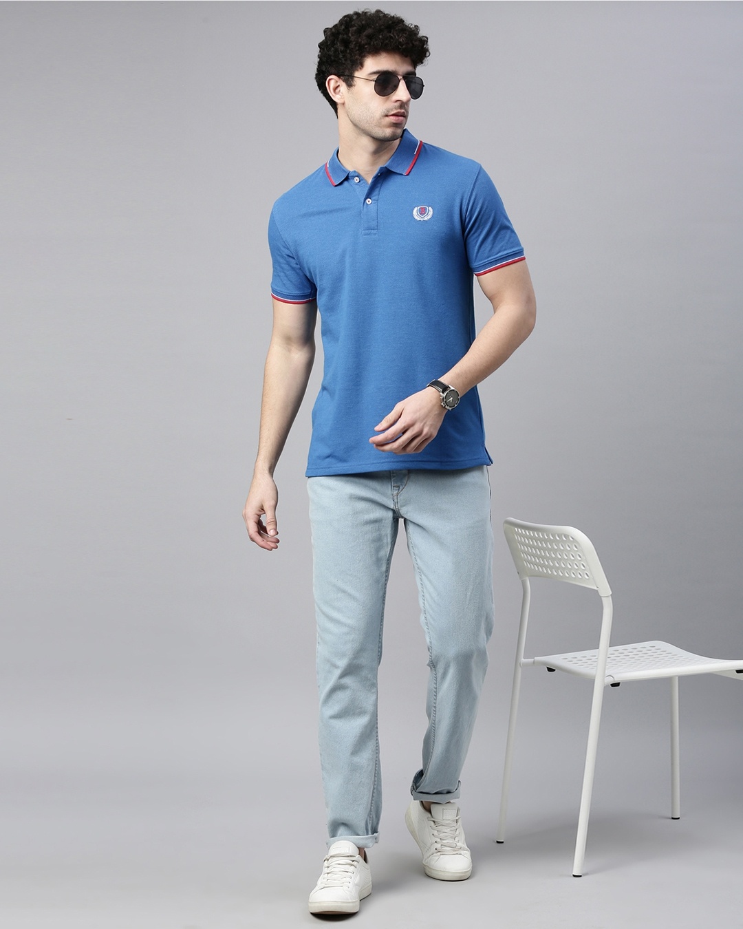 men wearing blue t-shirt combination with jeans