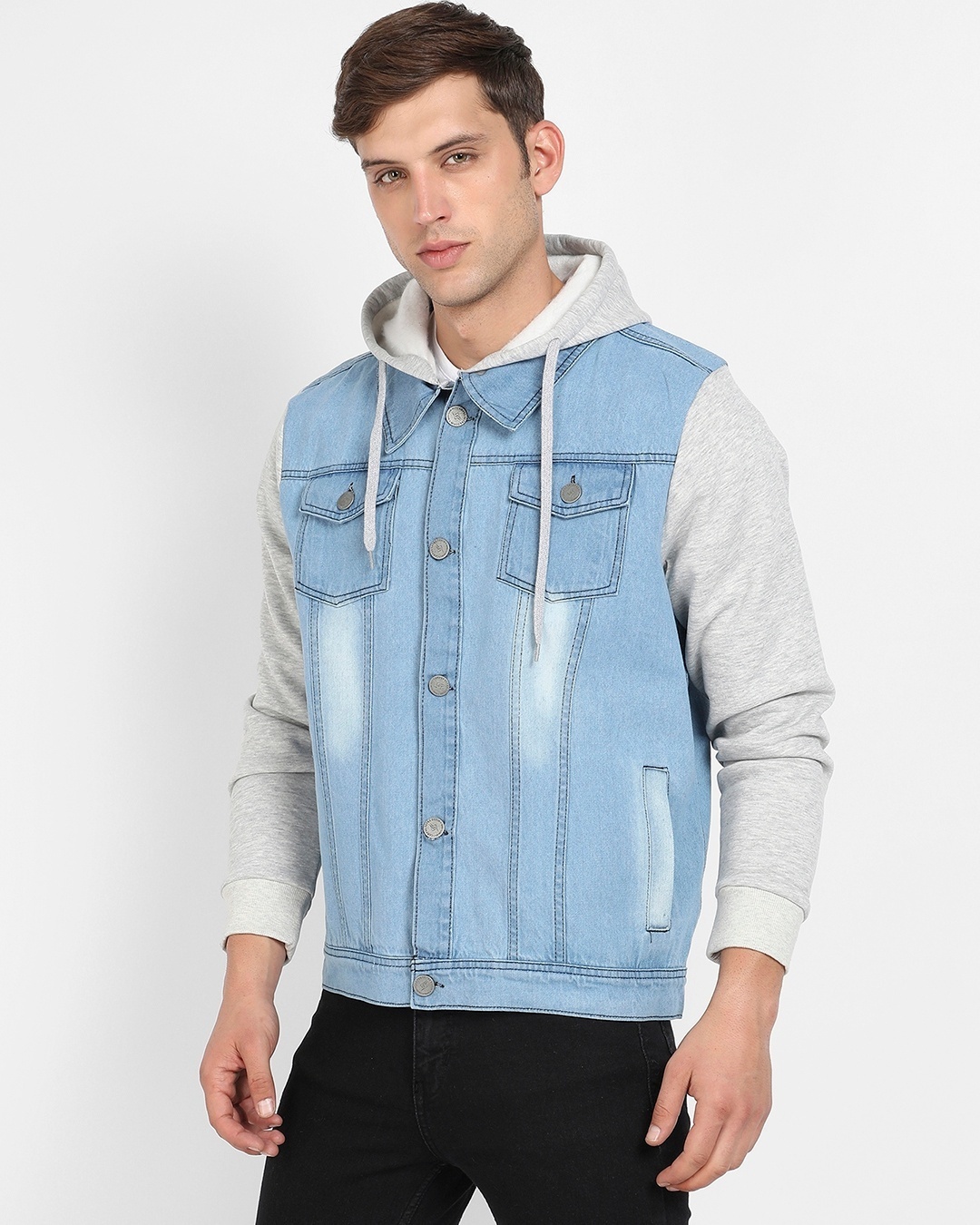 man styled a hoodie with light blue denim jeans