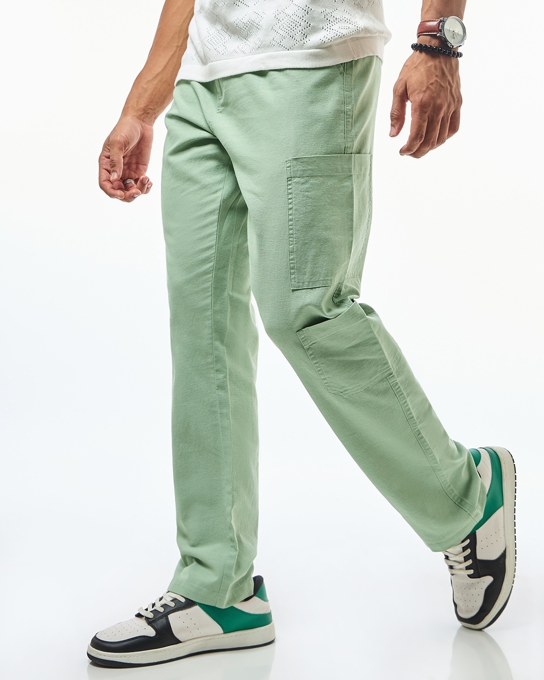 man styled pale green cargo pant with snaeker