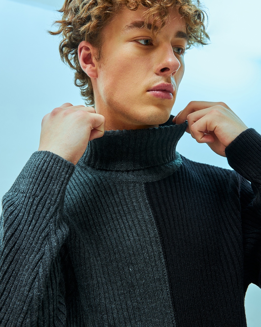 man wearing turtle neck sweater