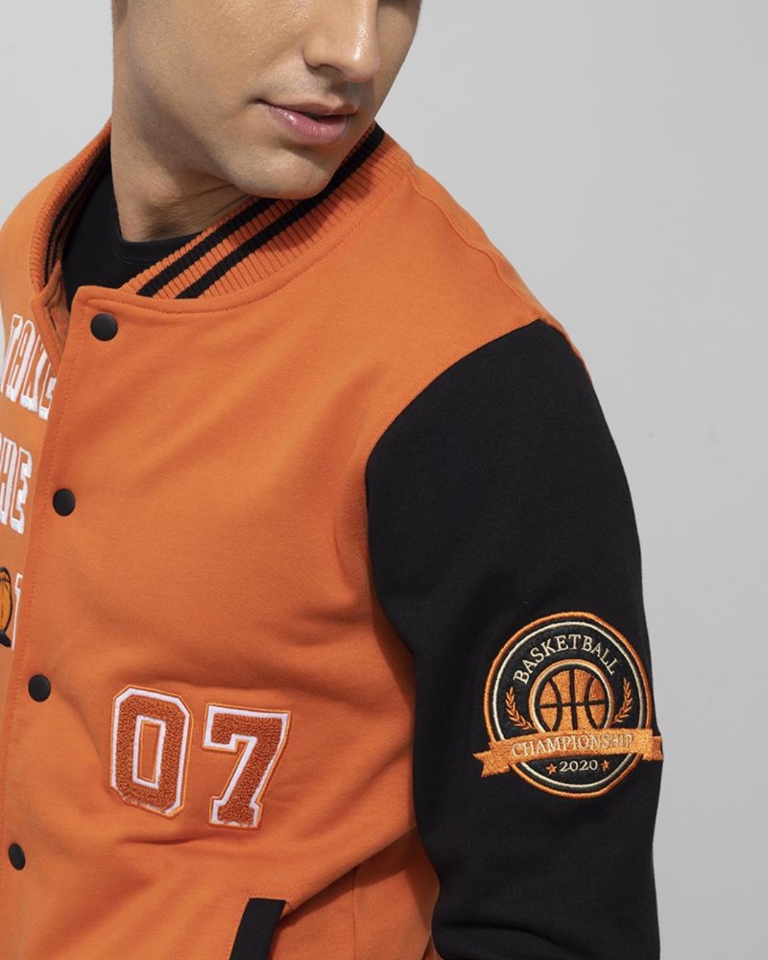 varsity jacket orange and black