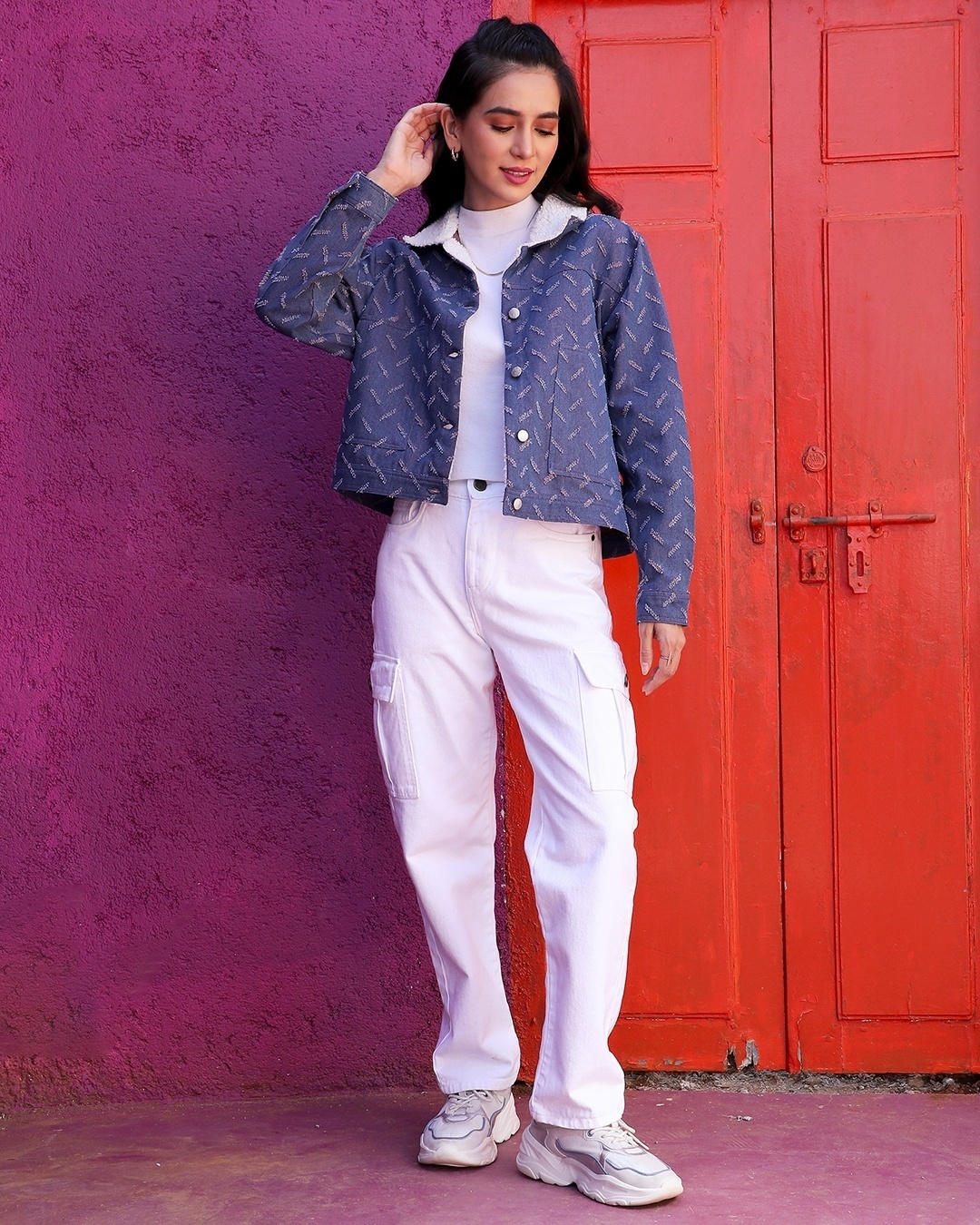 woman styled a blue jacket with white jean