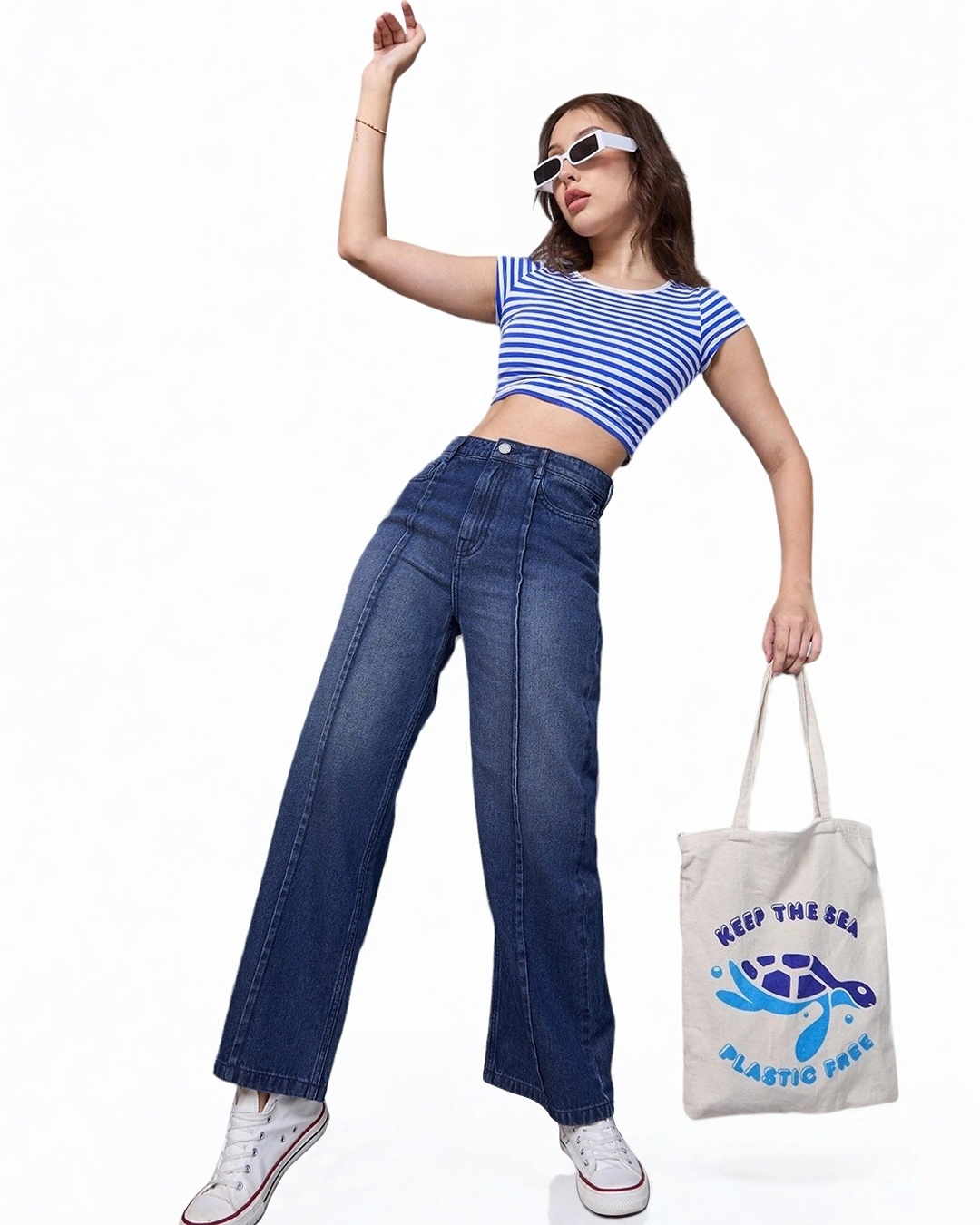 woman styled straight leg jean with top and sneakers