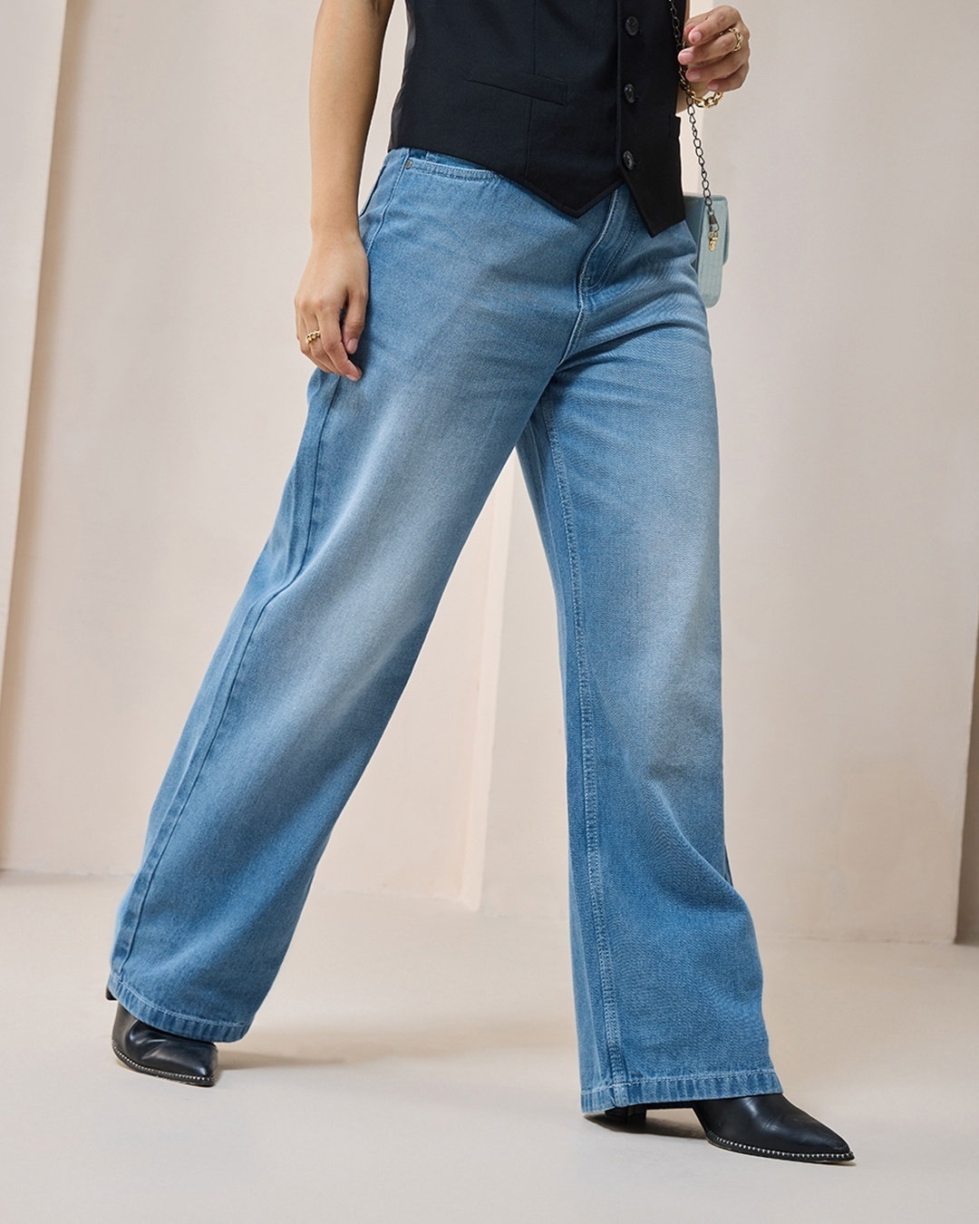 model wearing jeans with Round Neck T-shirt
