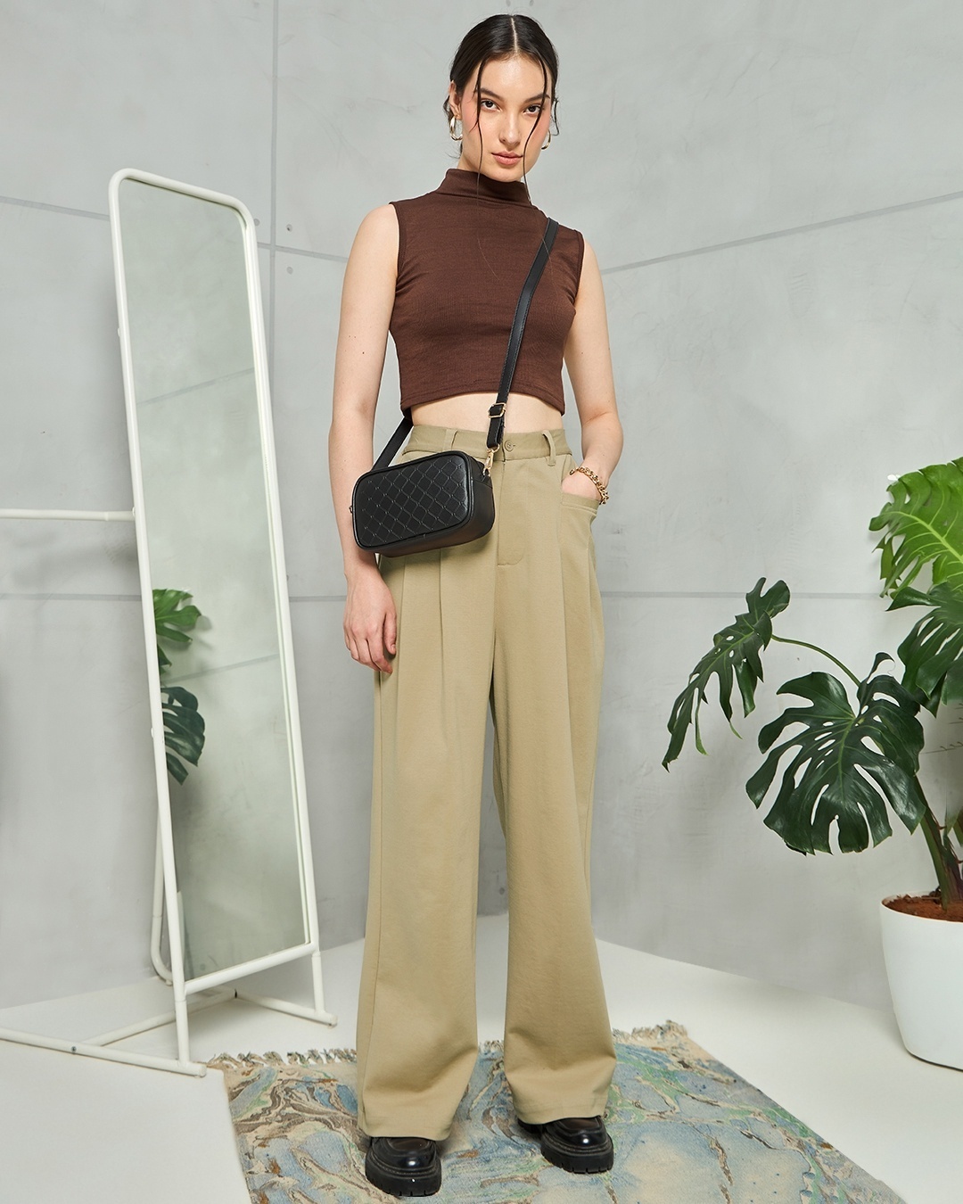 woman styled a pant with tank top