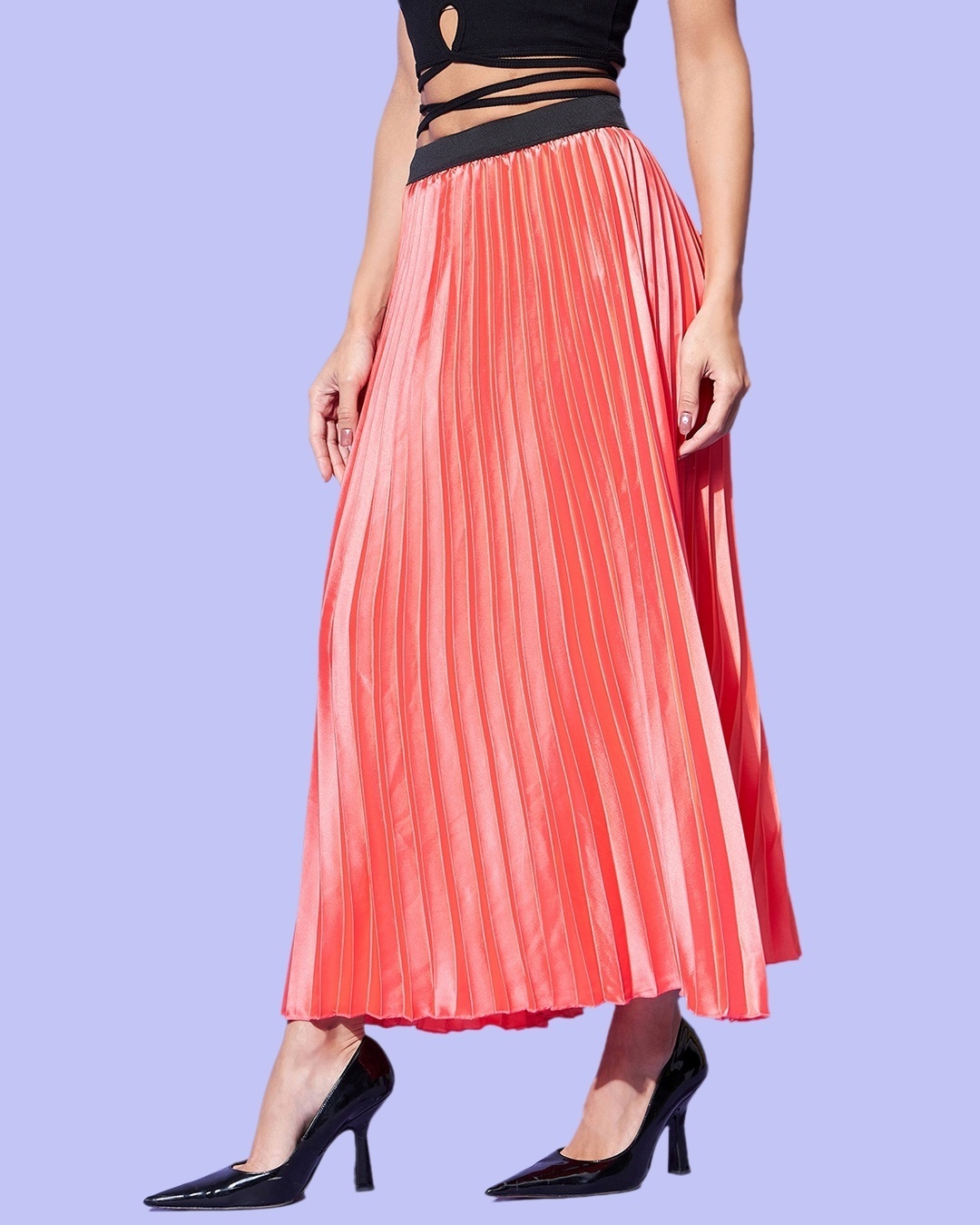 pleated skirt paired with black heel