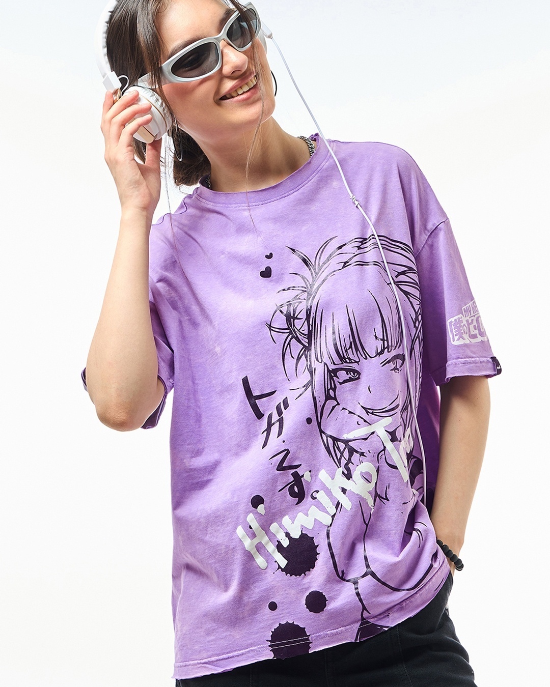 Women's Purple Graphic Printed Oversized T-shirt paired with leather skirt

