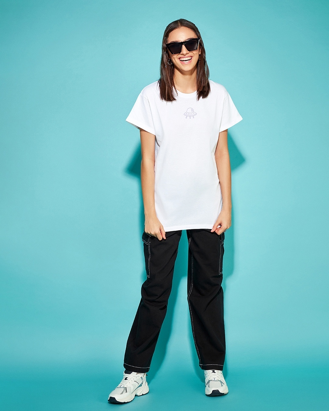 Women's White Space Graphic Printed Boyfriend T-shirt paired with colorful sneakers