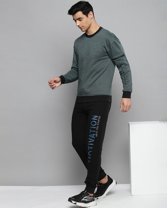 Shop Men Black Solid Slim Fit Joggers With Printed Detail