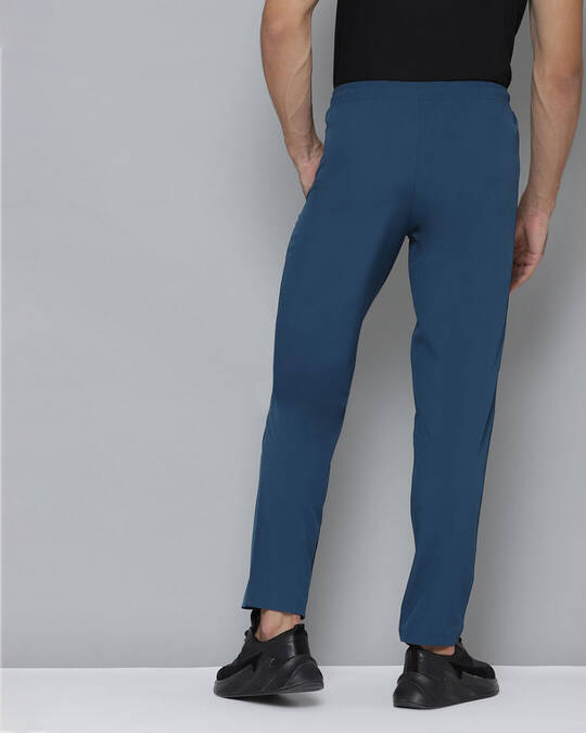 Shop Men Blue Solid Slim Fit Knitted Track Pants-Back