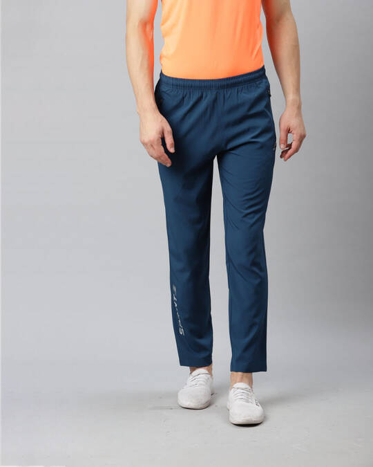 Shop Men Teal Blue Solid Stretchable Track Pants-Front