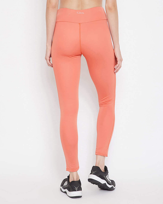 Shop Women's Snug Fit Active Text Print Ankle Length Tights In Coral Orange-Back