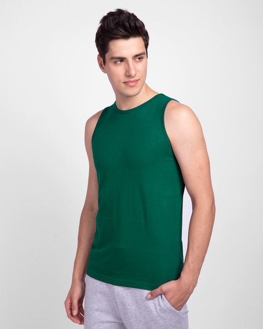 black shirt green vest