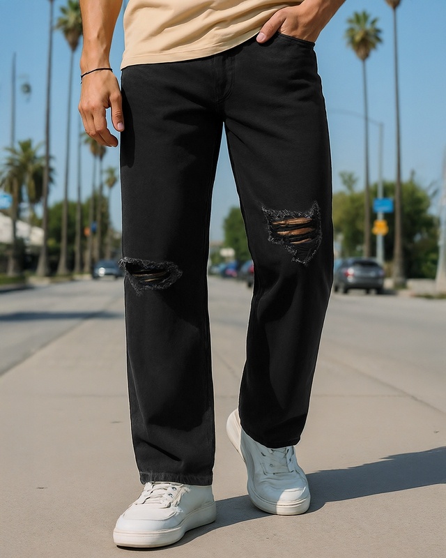 Shop Men's Black Baggy Fit Distressed Mid-Rise Jeans-Front