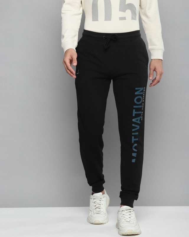 Shop Men's Black Solid Slim Fit Joggers With Printed Detail-Front