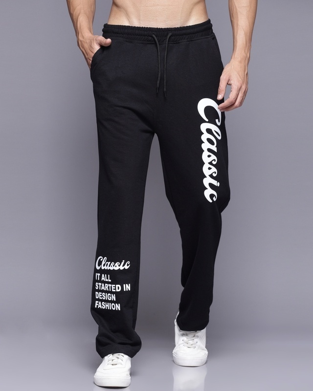 Shop Men's Black Typography Relaxed Fit Track Pants-Front