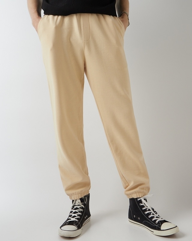 Shop Men's Beige Textured Joggers-Front