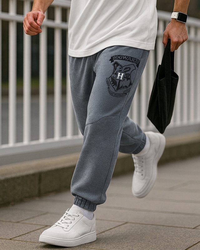 Shop Men's Charcoal Grey Melange Hogwarts Graphic Printed Oversized Joggers-Front