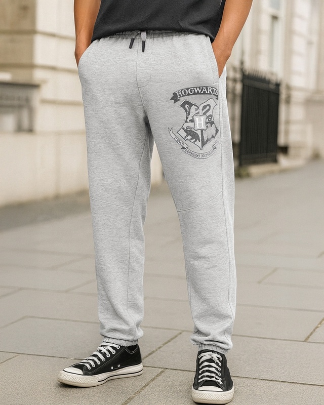 Shop Men's Grey Melange Hogwarts Graphic Printed Oversized Joggers-Front