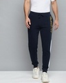 Shop Men Navy Blue Solid Slim Fit Joggers With Printed Detail-Front