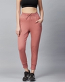 Shop Women Peach Coloured Slim Fit Solid Cropped Track Pants-Front