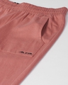 Shop Women Peach Coloured Slim Fit Solid Cropped Track Pants