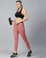 Shop Women Peach Coloured Slim Fit Solid Cropped Track Pants