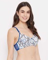 Shop Padded Non Wired Full Cup Abstract Print T-shirt Bra In White-Full