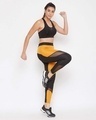 Shop Women's Snug Fit Active Colourblock Ankle Length Tights In Mustard