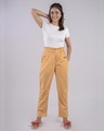 Shop Women Beige Solid Tapered Fit Casual Pants-Front