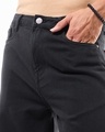 Shop Men's Black Baggy Fit Distressed Mid-Rise Jeans