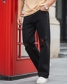 Shop Men's Black Baggy Fit Distressed Mid-Rise Jeans-Front