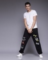 Shop Men's Black Graphic Printed Relaxed Fit Joggers-Full