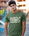 Shop Men's Green Hustle Rebel Repeat Typography T-shirt-Front